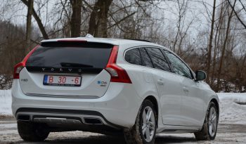 Tikko ievests. 2014. Gada modelis. Volvo. V60 Plug-In Hybrid Summum. 2.4D6 (158kw -215z/s diesel + 50Kw-68z/s Electro= 283z/s) Awd pilnpiedziņa. Krāsa Baltā pērle. full